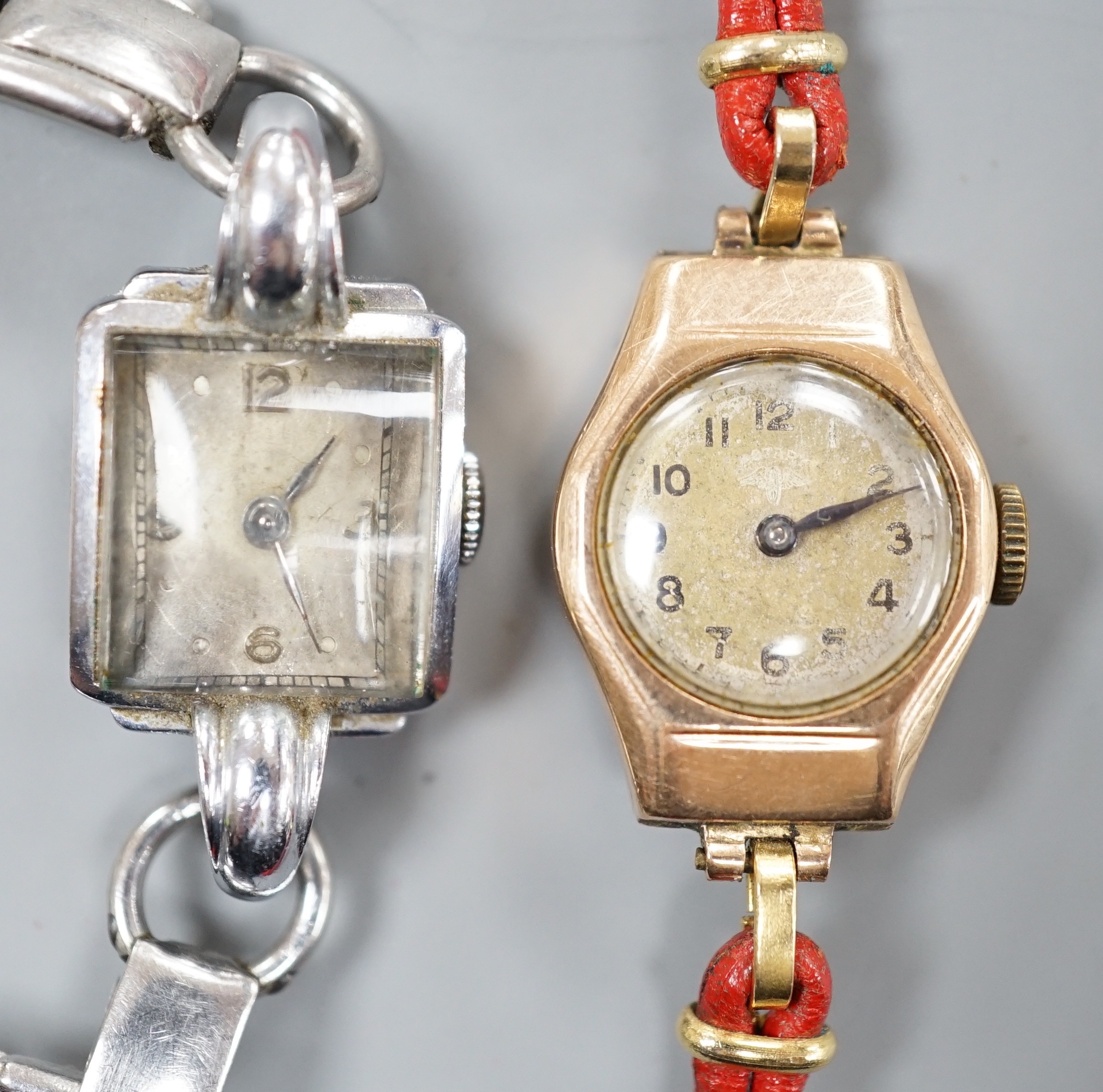 A lady's 9ct gold Rotary manual wind wrist watch, on a fabric strap, together with a lady's stainless steel manual wind wrist watch.